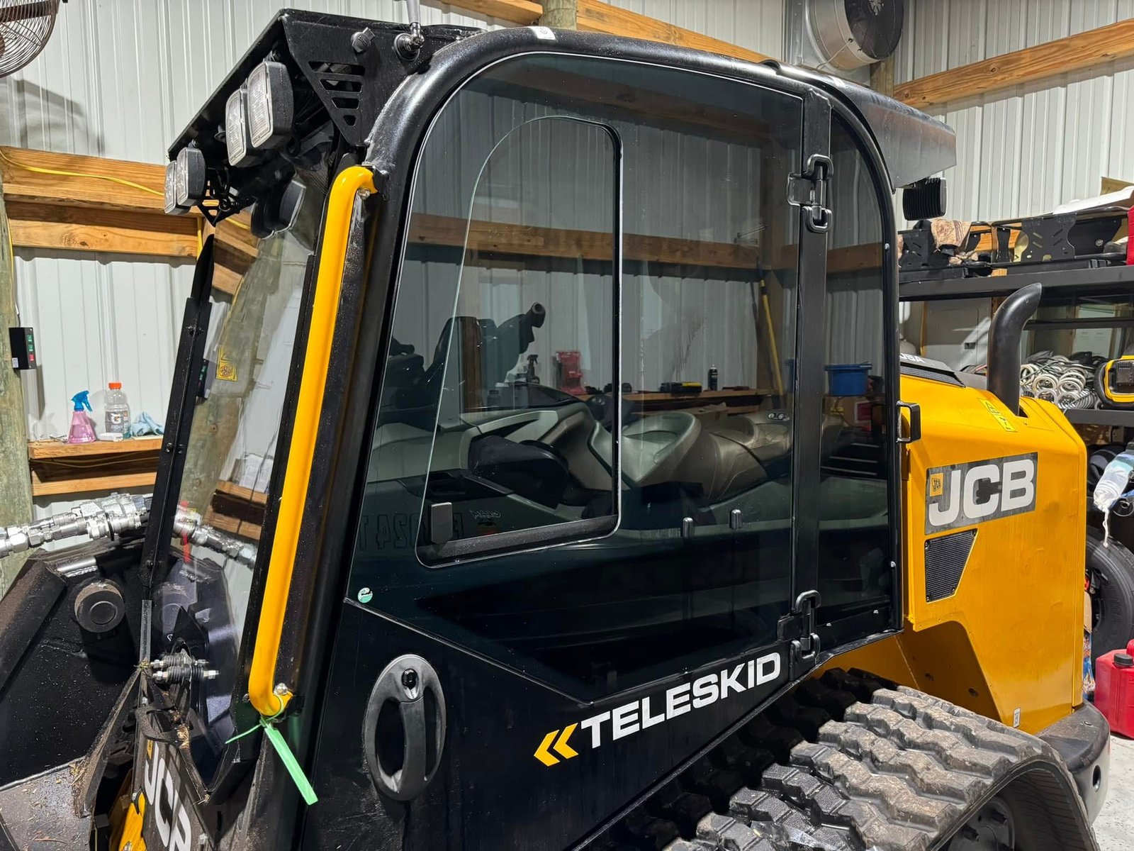 JCB Teleskid — Full cab tint · Navarre FL — window tint by Elite Window Tinting