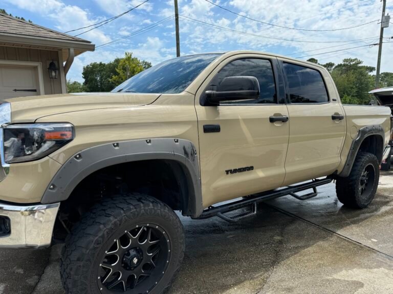 Toyota tundra being tinted by elite window tinting window tinting near me